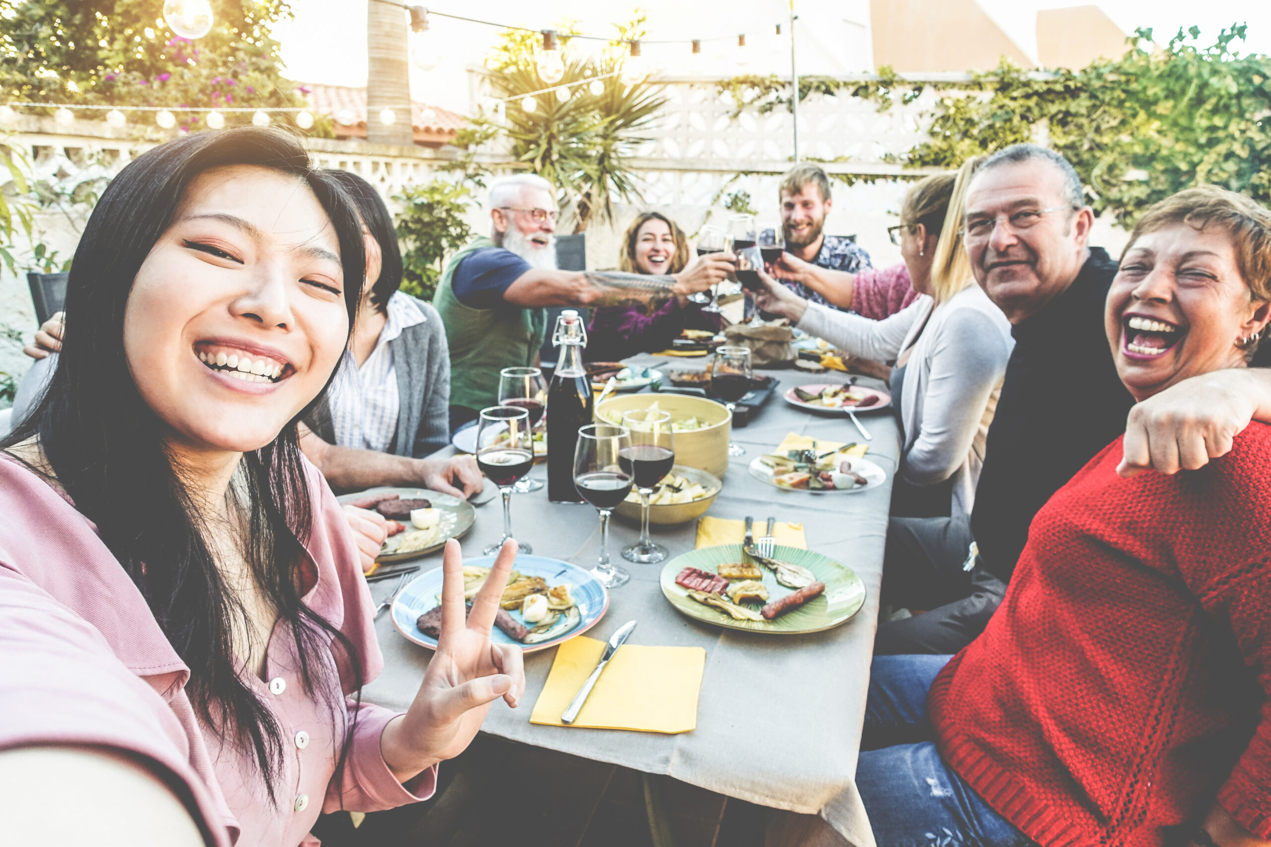 Happy,Family,And,Friends,Taking,Selfie,At,Barbecue,Dinner,-