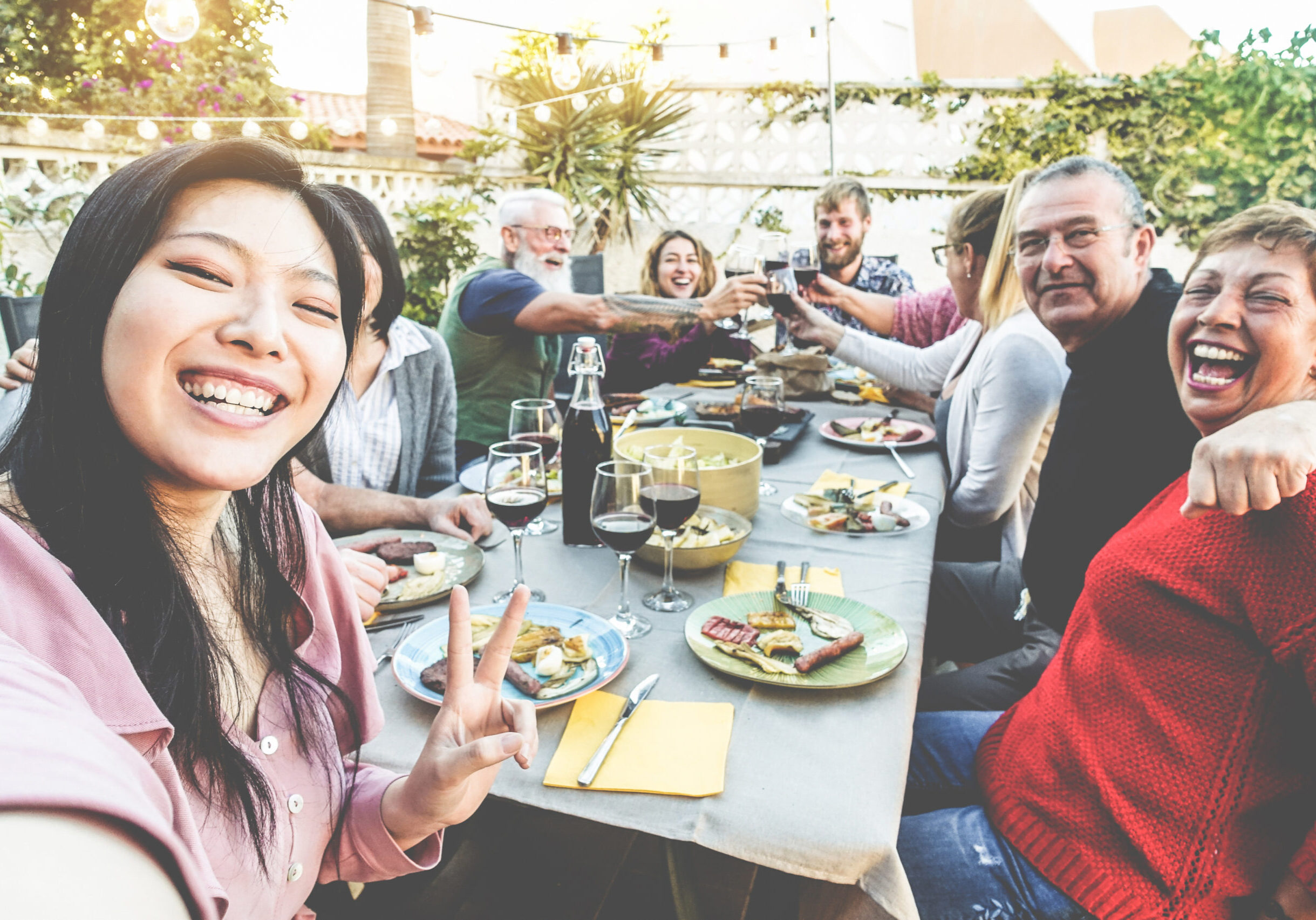 Happy,Family,And,Friends,Taking,Selfie,At,Barbecue,Dinner,-