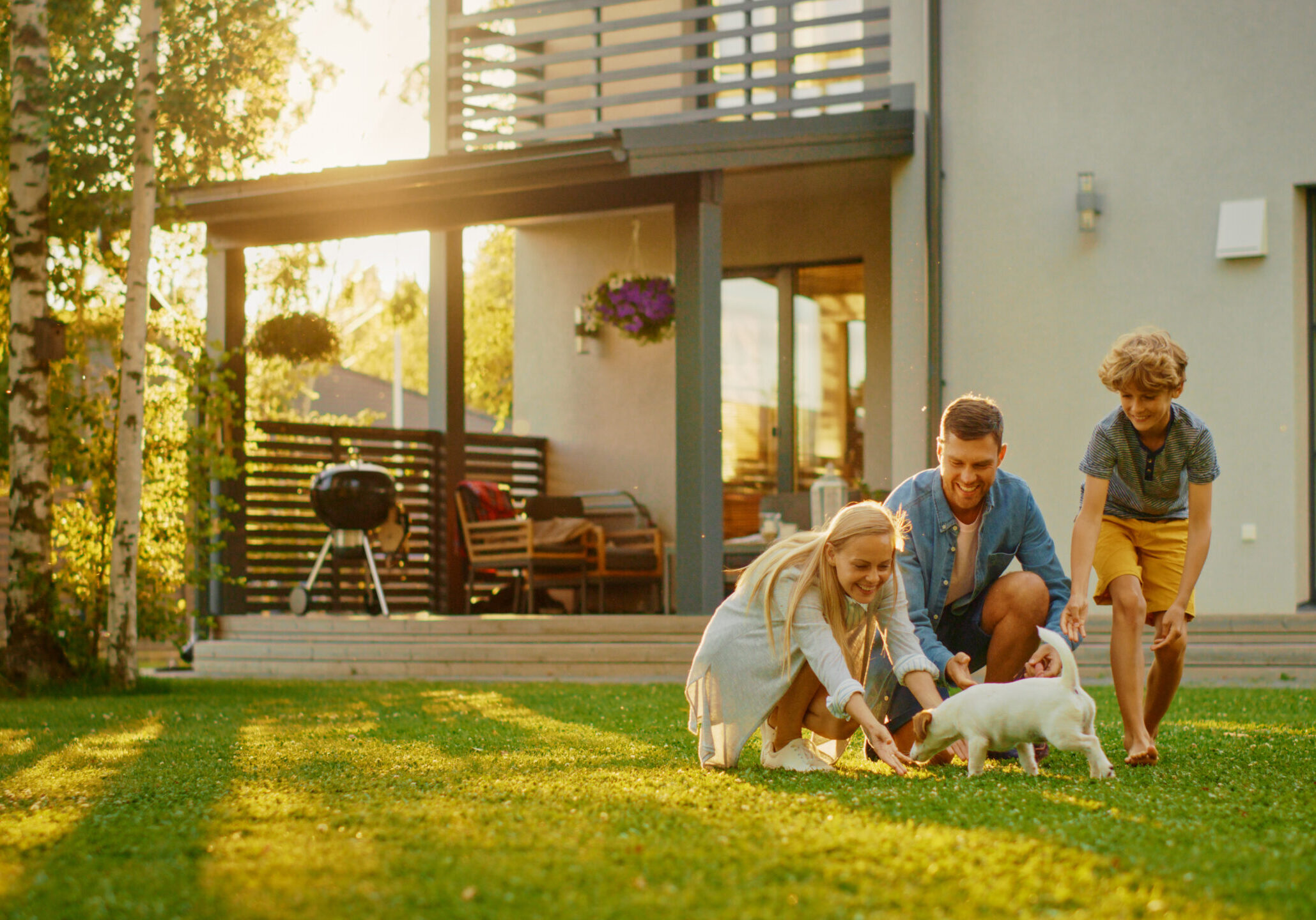 Smiling,Father,,Mother,And,Son,Pet,And,Play,With,Smooth